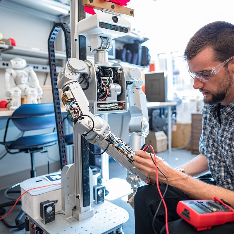 Grad Student Works in the Robotics Lab