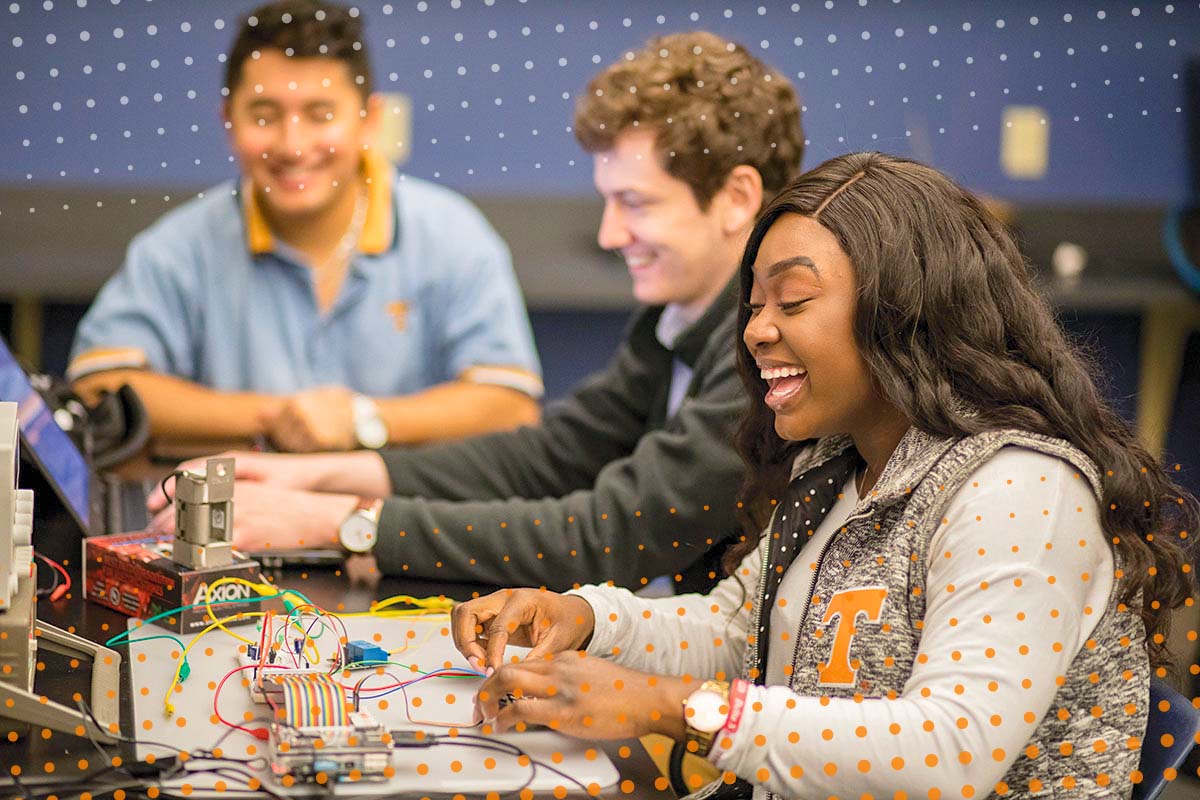 Arianna using equipment in an EECS Lab