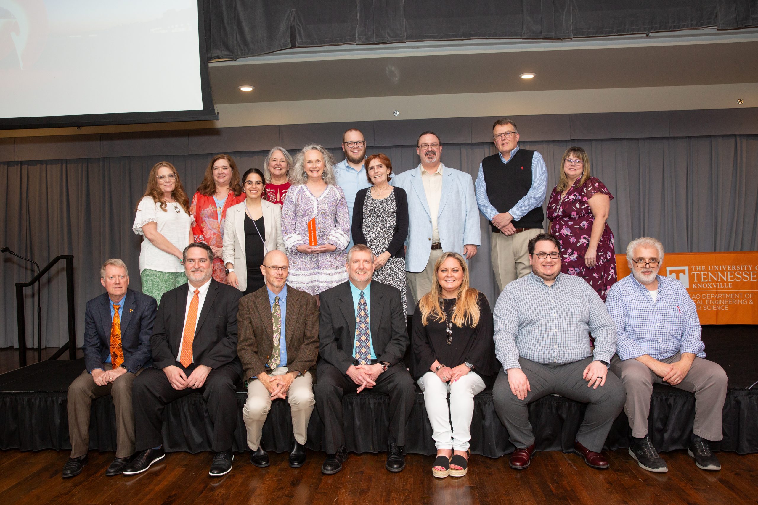 Lori Houser, Tracy Smith, Reina Ortega, Charlotte Holland, Angie Chance, Dan Morehead, Melanie Kelley, Markus Iturriaga Woelfel, Don Reed, Michelle Camp, Leon Tolbert, Garrett Rose, Jens Gregor, Scott Wells, Erika Adams, Matthew Luc, and Dwayne Kelley at the EECS Faculty and Staff Awards