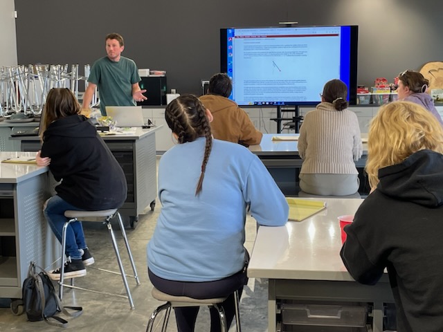 Dan Wilson teaching students in a lab