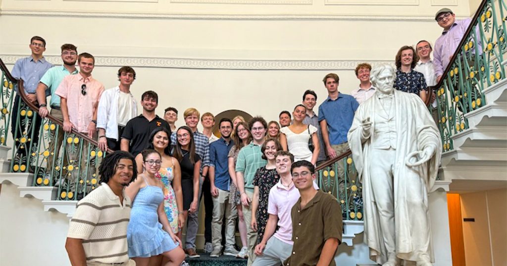 Engineering in London students on a staircase