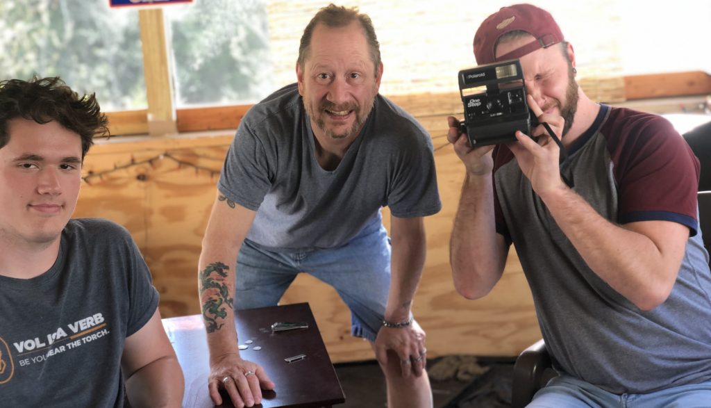 Trevor Olson, his dad, and his brother