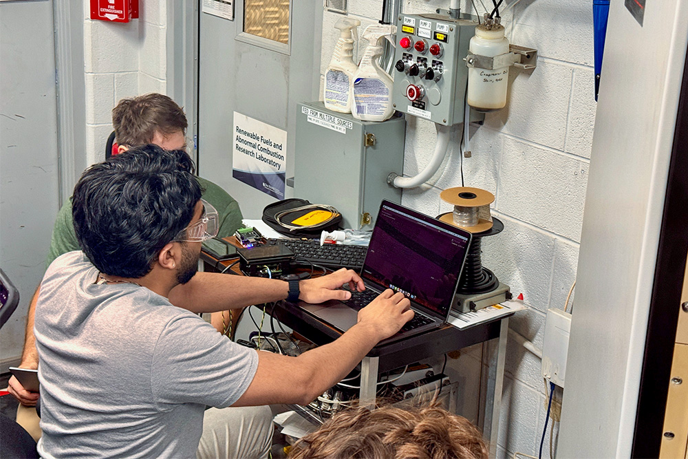 Catherine Schuman's students on a computer at Oak Ridge National Lab