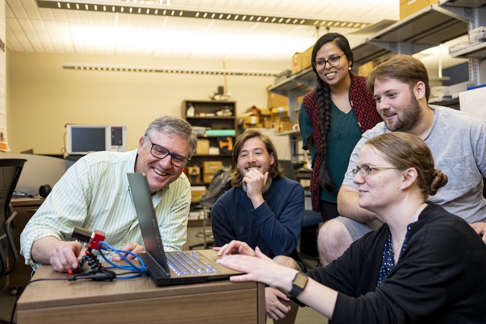 James Plank, Katie Schuman, and students in a computer lab