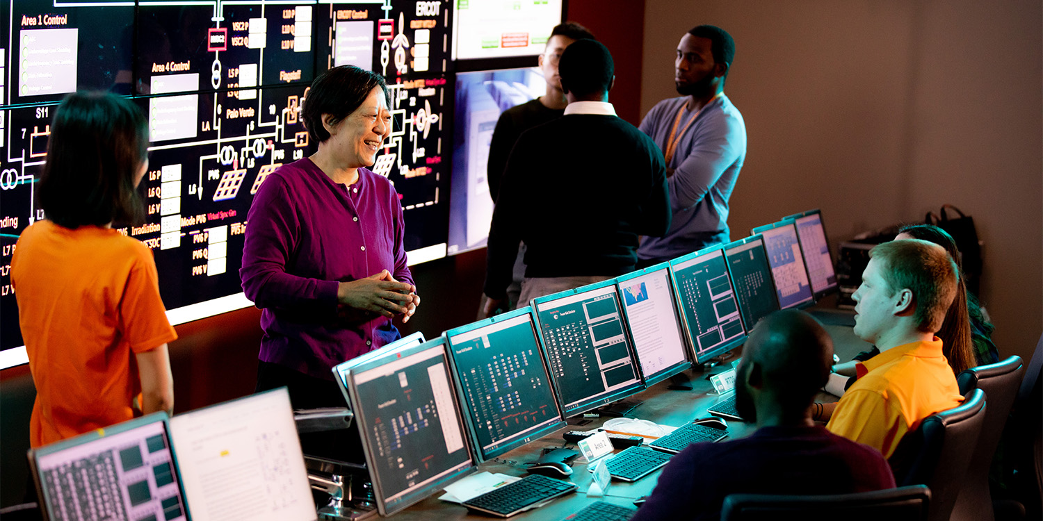 students and professor in the grid visualization lab