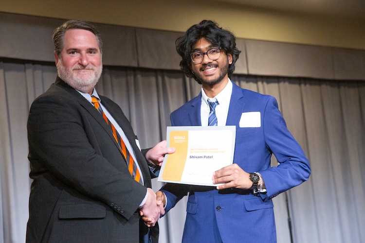 Garrett Rose and Shivam Patel shaking hands