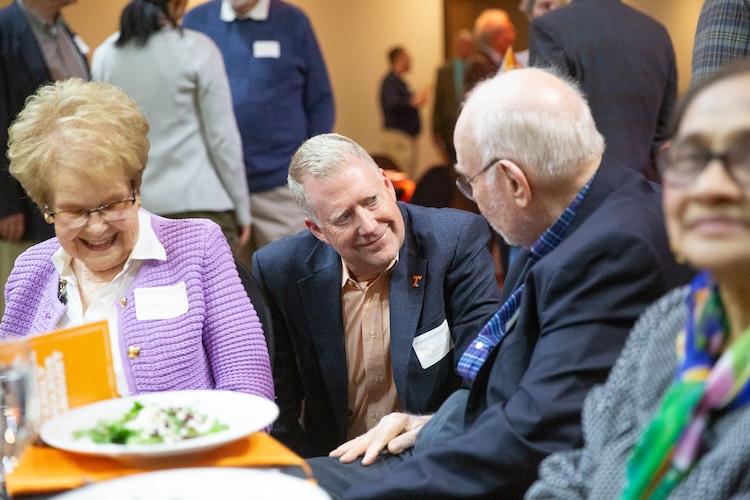 Leon Tolbert speaking with guests at a table at the 2025 Gonzalez Awards ceremony